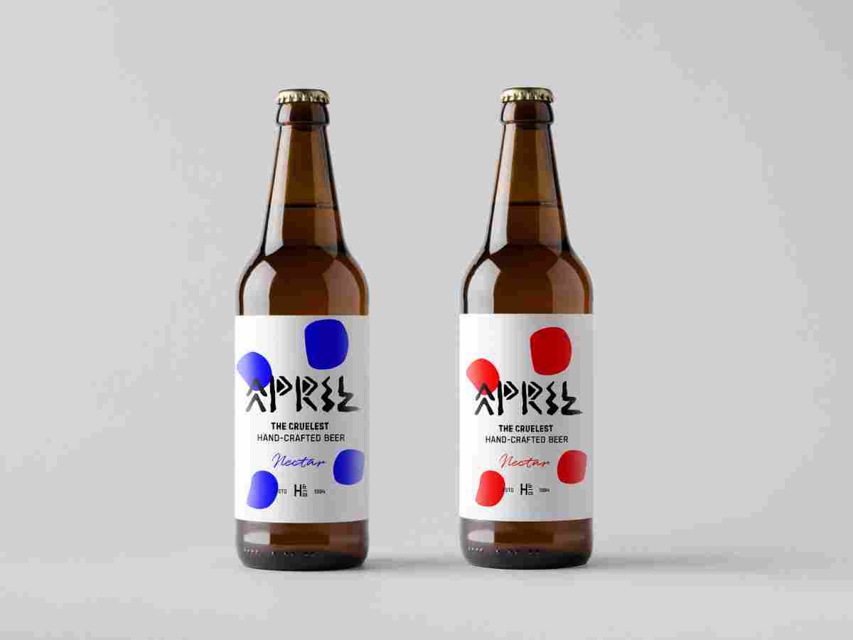 Two bottles of beer with red and blue designs.